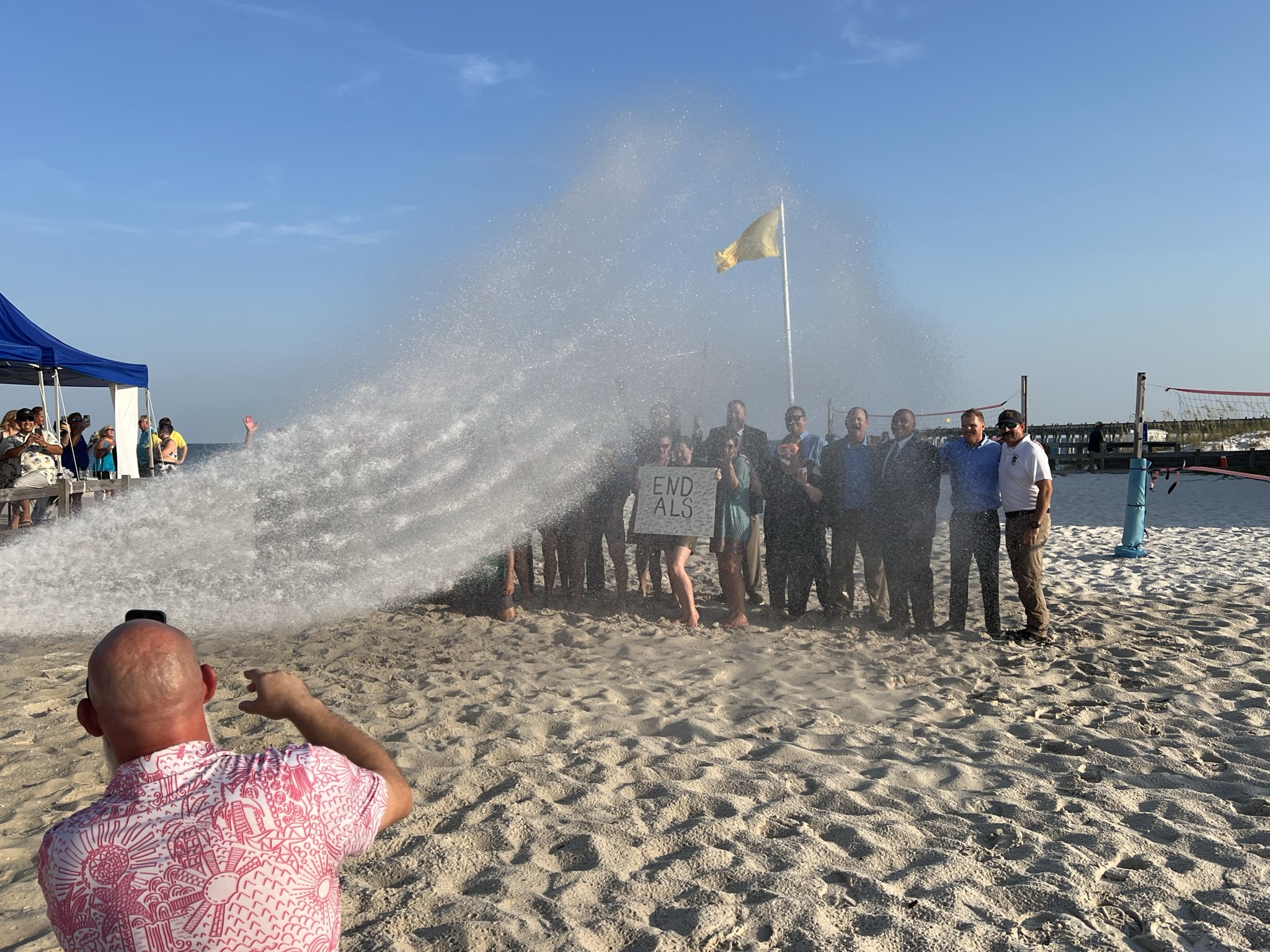 Community leaders getting soaked during the CEO Soak