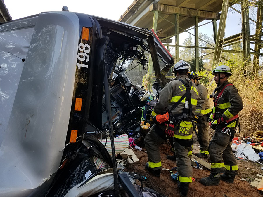 Fire rescue crews work at a bus accident in Alabama
