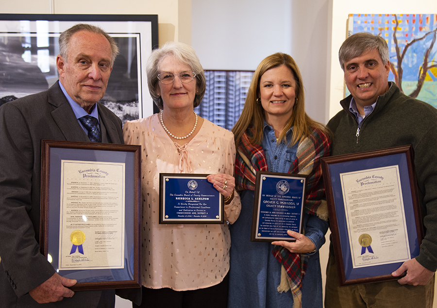 Former Commissioner Robinson with his wife, aide Becky Azelton and her husband