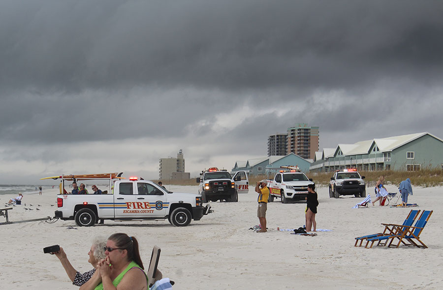 Lifeguards performing a rescue on Pensacola Beach