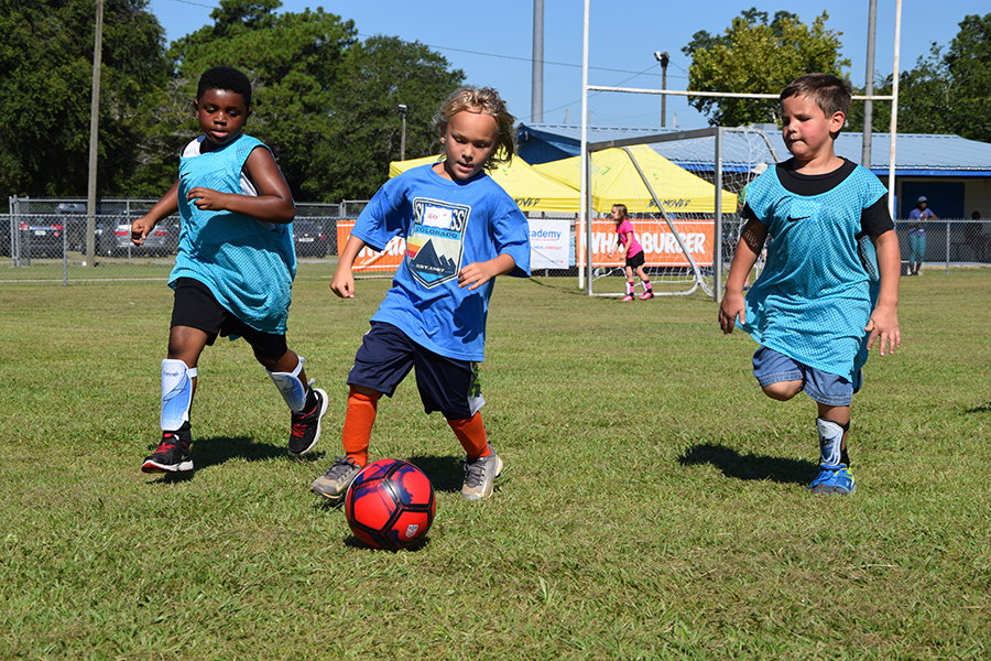 Youth participate in the Kick Start Soccer Clinic at Escambia County's Brent Athletic Park.