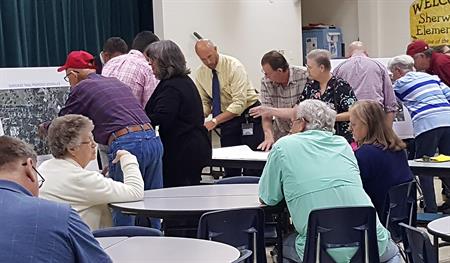 Staff speak with residents at Cherokee Trail meeting
