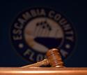 Photo of a Gavel and Escambia Seal
