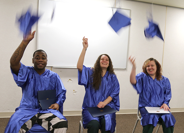 Darquavious Hamilton, Toya Patterson and Courtney Dunlavy graduated with their GED diploma Wednesday, June 13 at the Escambia County Jail.