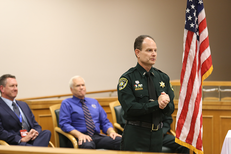 1st Lt. Jason Walker addresses award recipients at the Aug. 22 Corrections Staff Award Ceremony