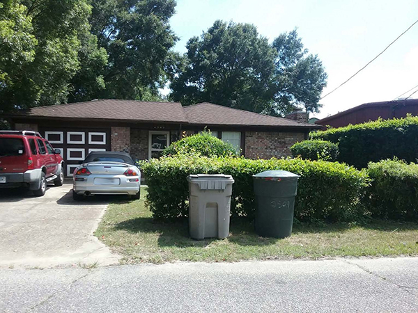 The clean curb in front of a house after items were picked up during the Aug. 15 Brownsville/Englewood Neighborhood Cleanup.