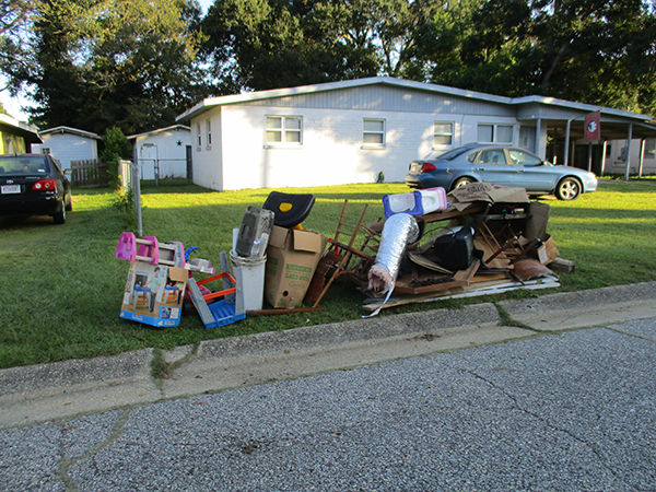 Photo of items left at the curb for pickup during the Oct. 3 Crescent Lake Neighborhood Cleanup.