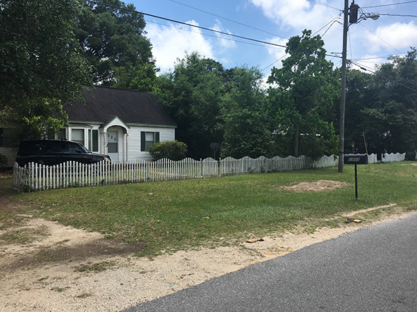 A clean curbside after items were picked up during the West Barrancas Neighborhood Cleanup