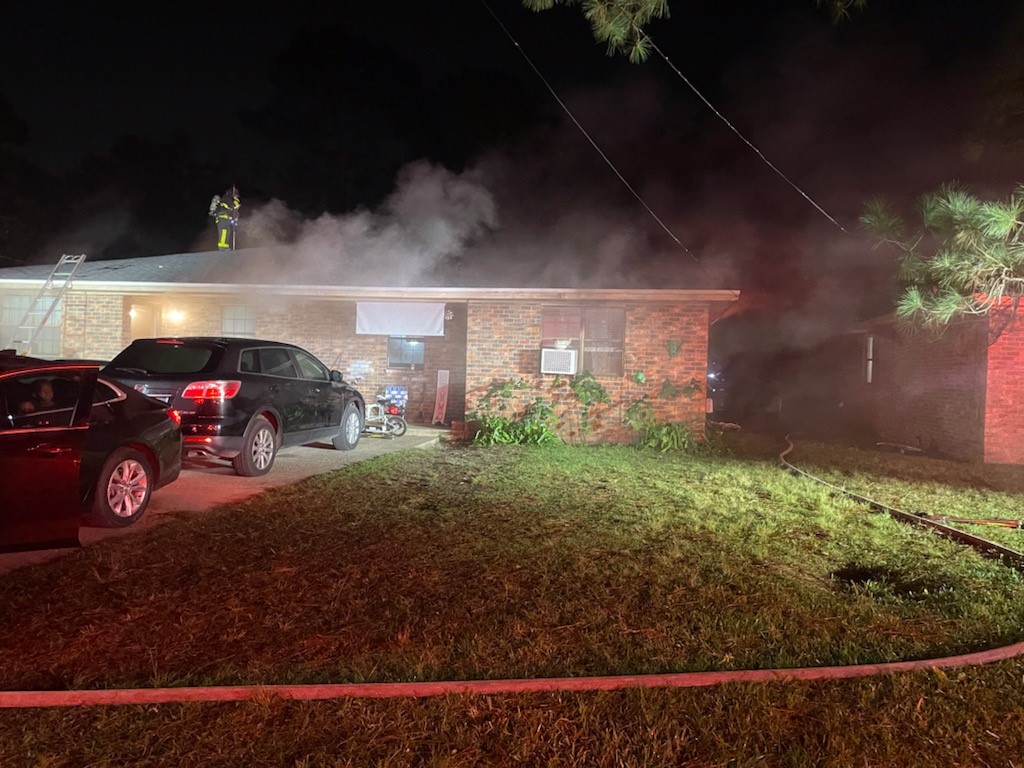 Home with smoke showing.