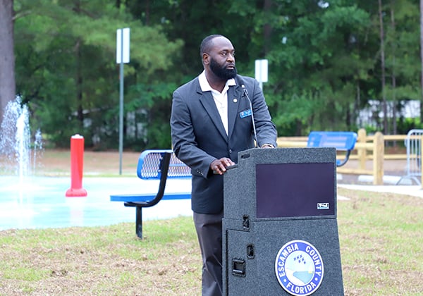 District 1 Chief of Staff Hassan Hills speaks at the Beulah Regional Park Grand Reopening Event