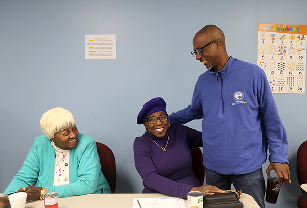 Commissioner Lumon May visits with the Brownsville Silver Seniors