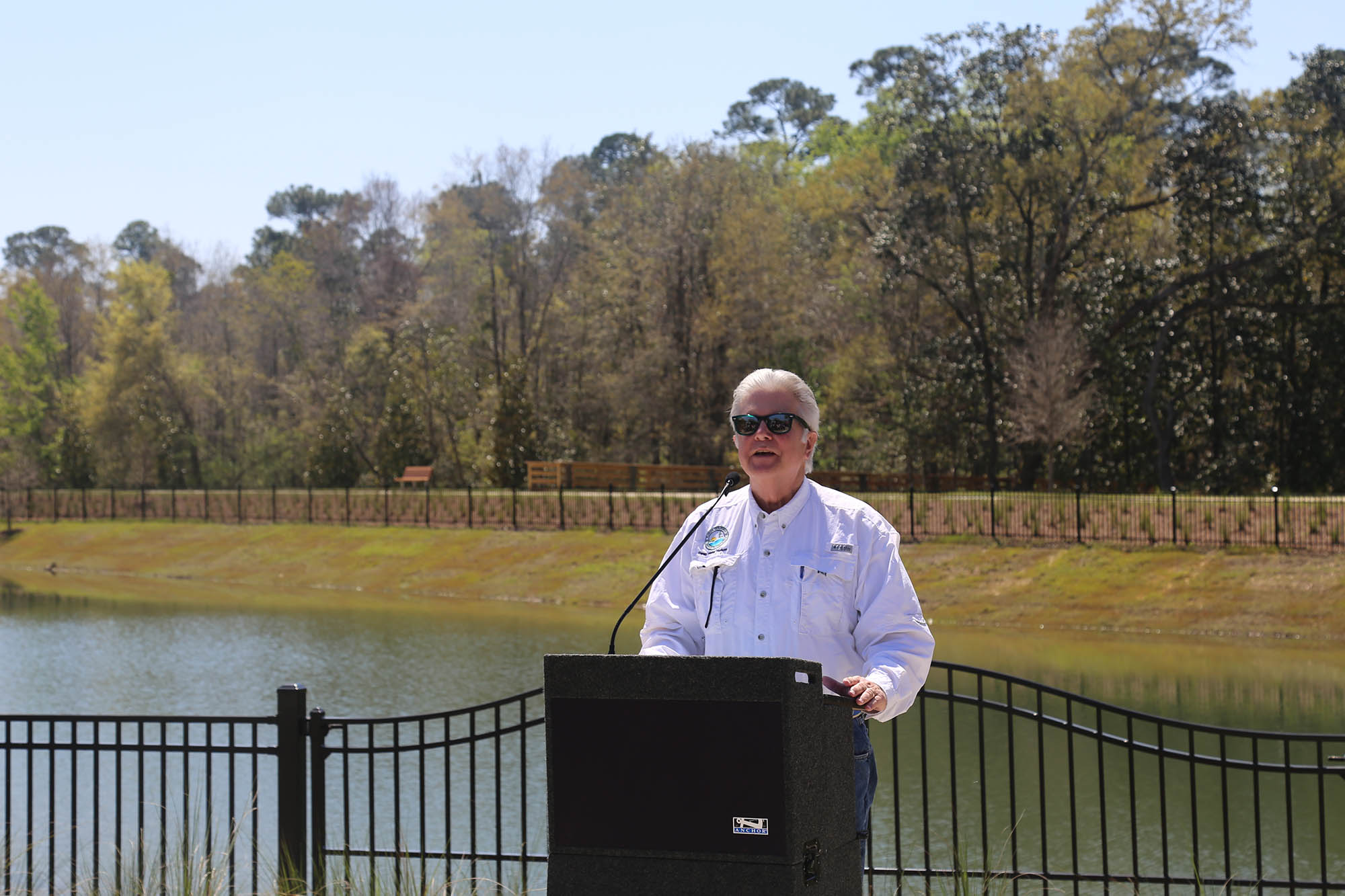 Pearce Barrett speaks during Carpenter Creek Headwaters Creek Ribbon Cutting