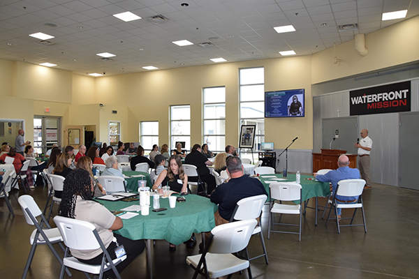 Approximately 60 people attend the Cold Weather Forum at Waterfront Rescue Mission on Nov. 8, 2023