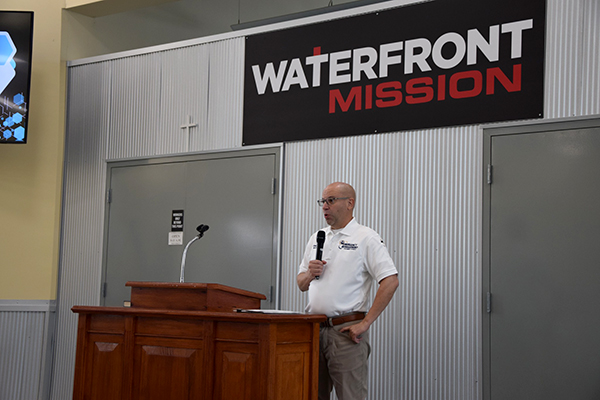 Escambia County Emergency Manager Travis Tompkins speaks at the Cold Weather Forum at Waterfront Rescue Mission on Nov. 8.