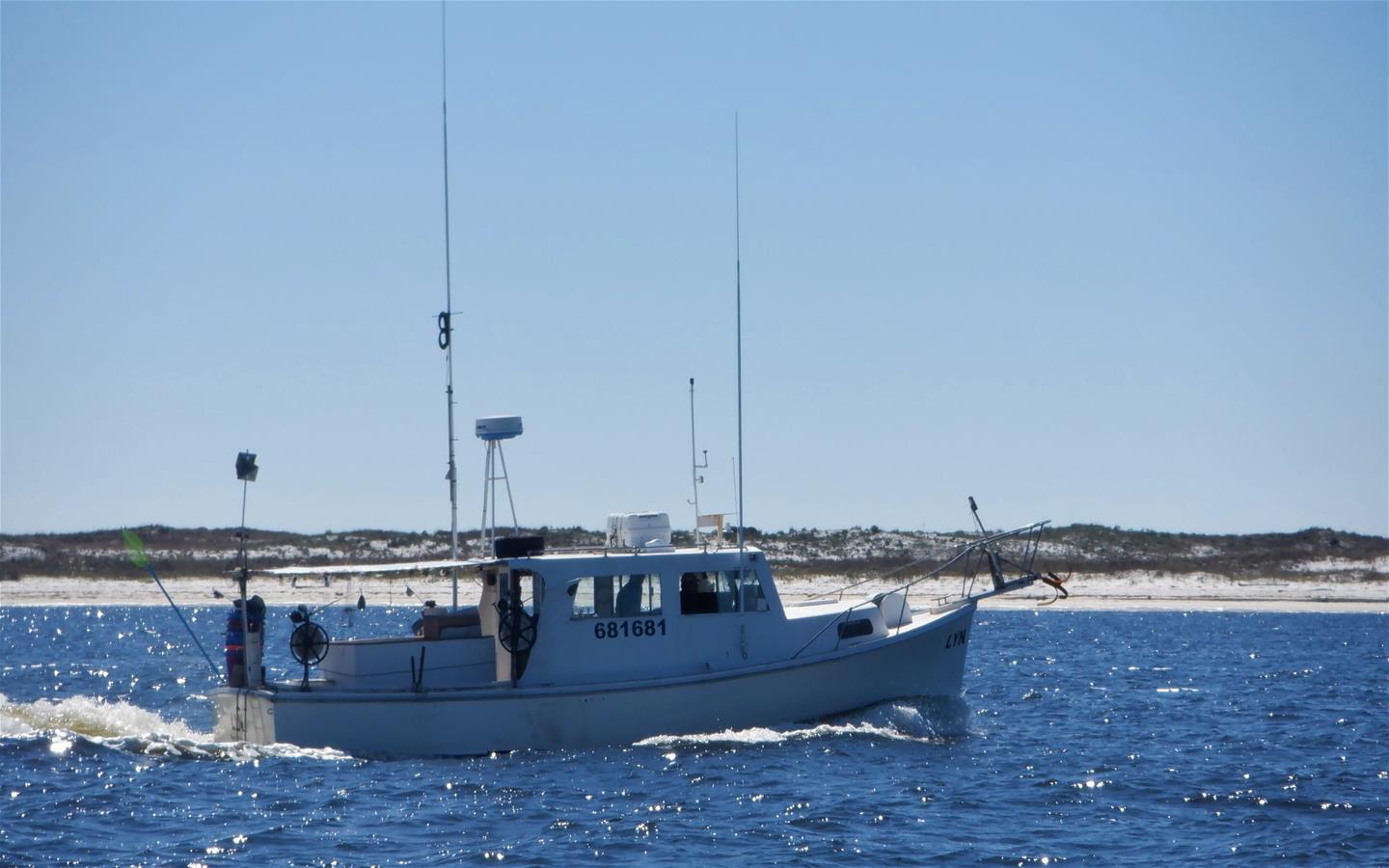 Photo of a boat out to sea