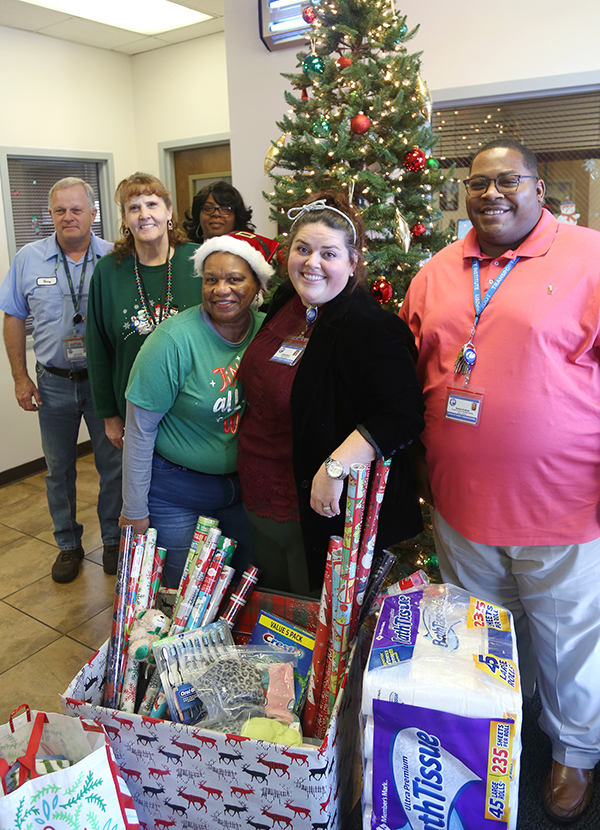 ECAT employees with donations collected for FavorHouse