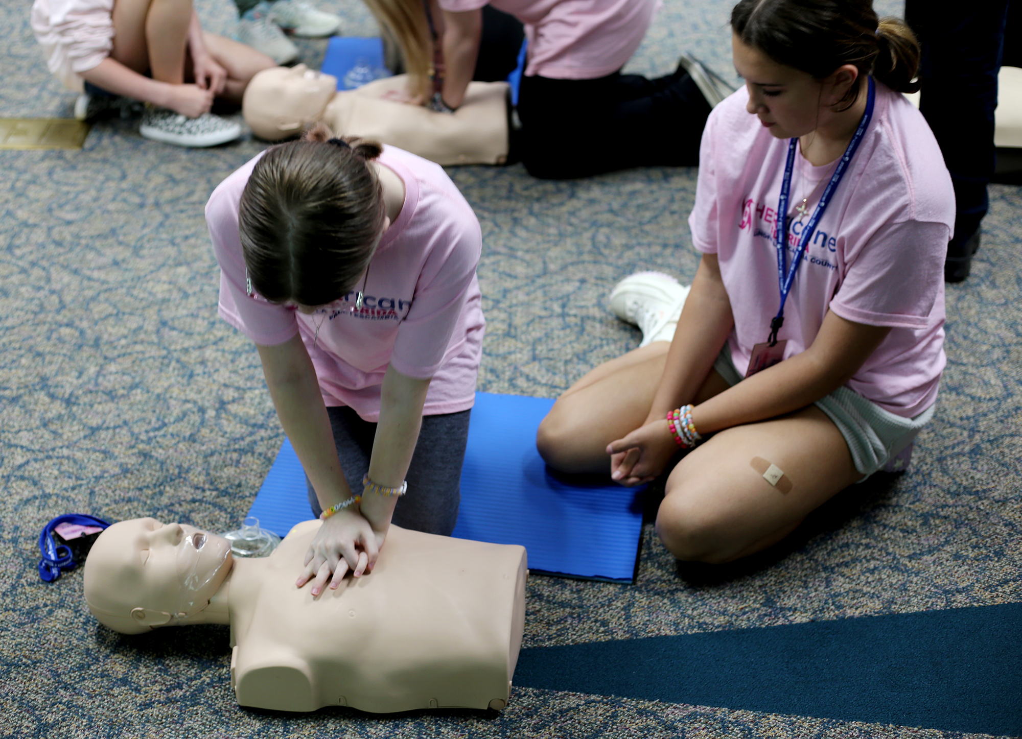 Campers learned CPR from Escambia County EMS