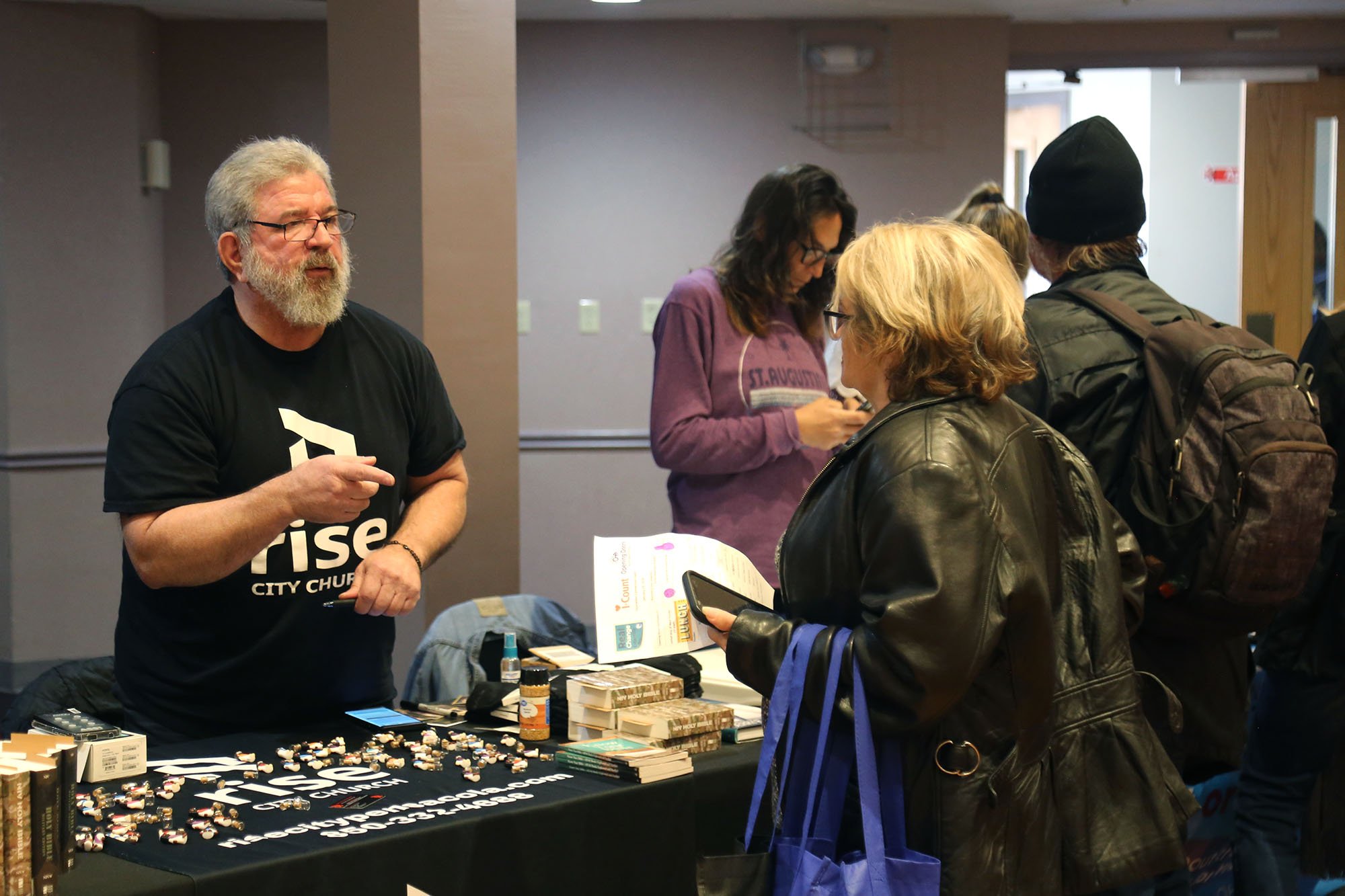 Man and woman at a vendor table