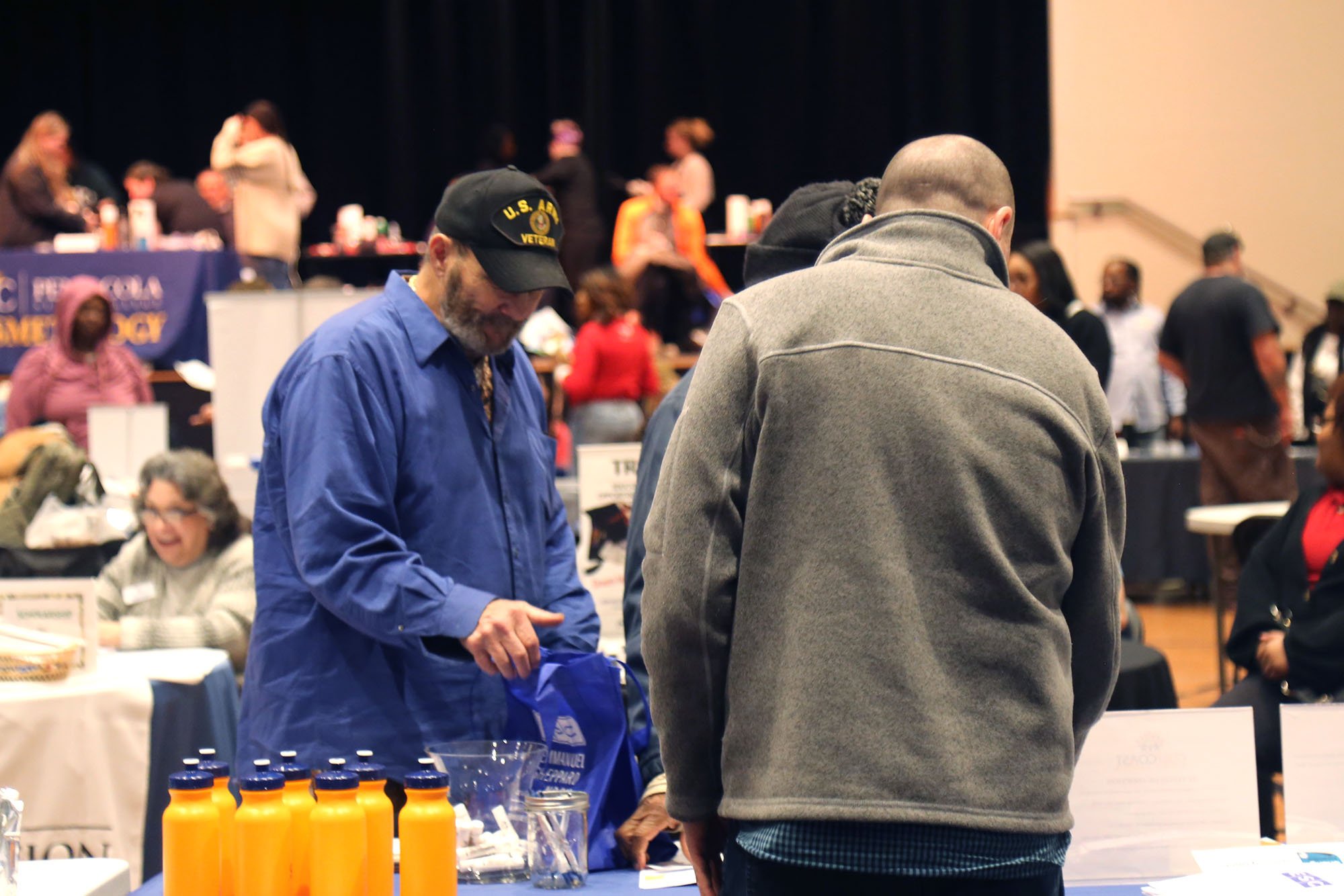 Man at a vendor table
