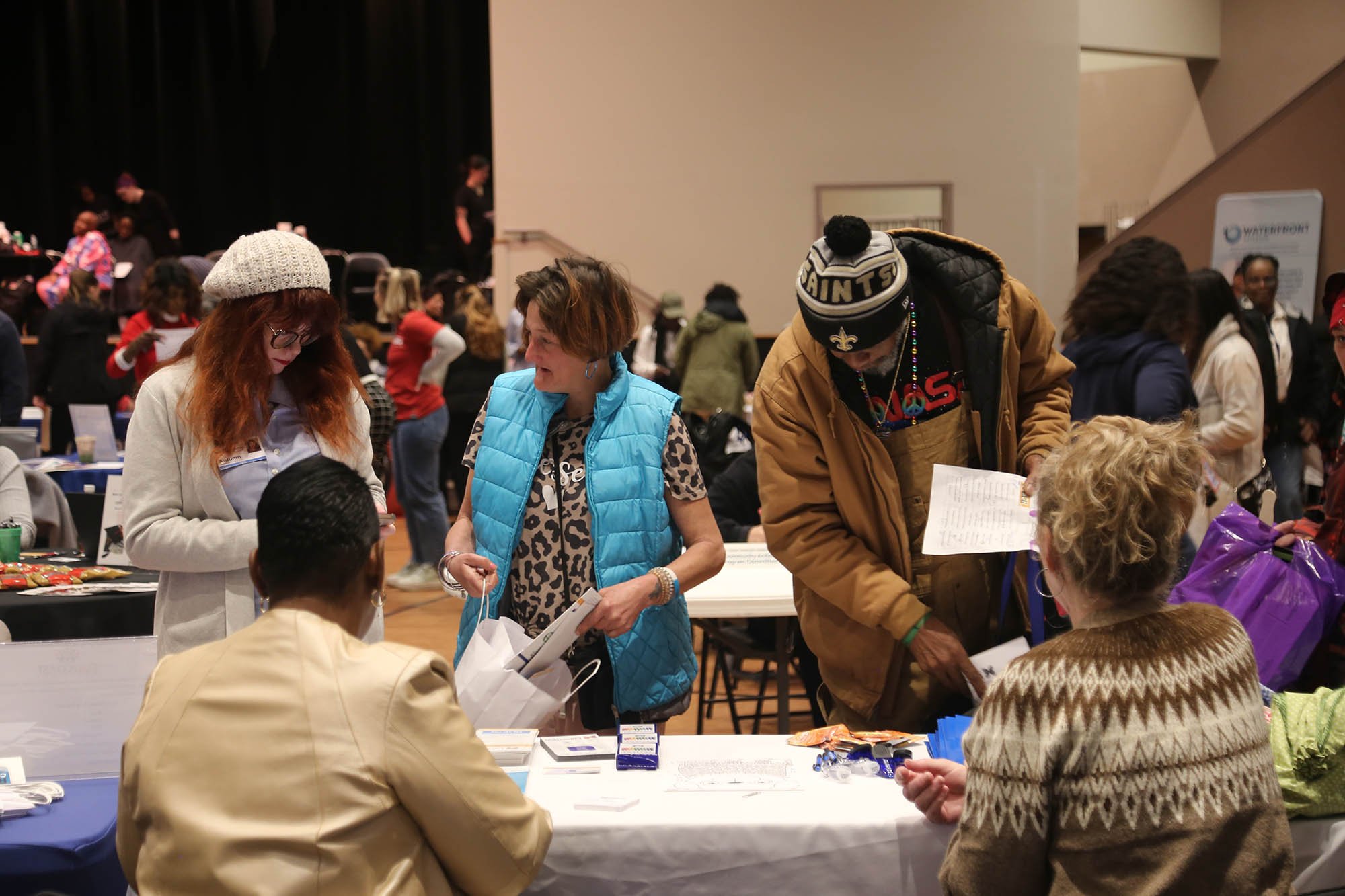 People at a vendor table