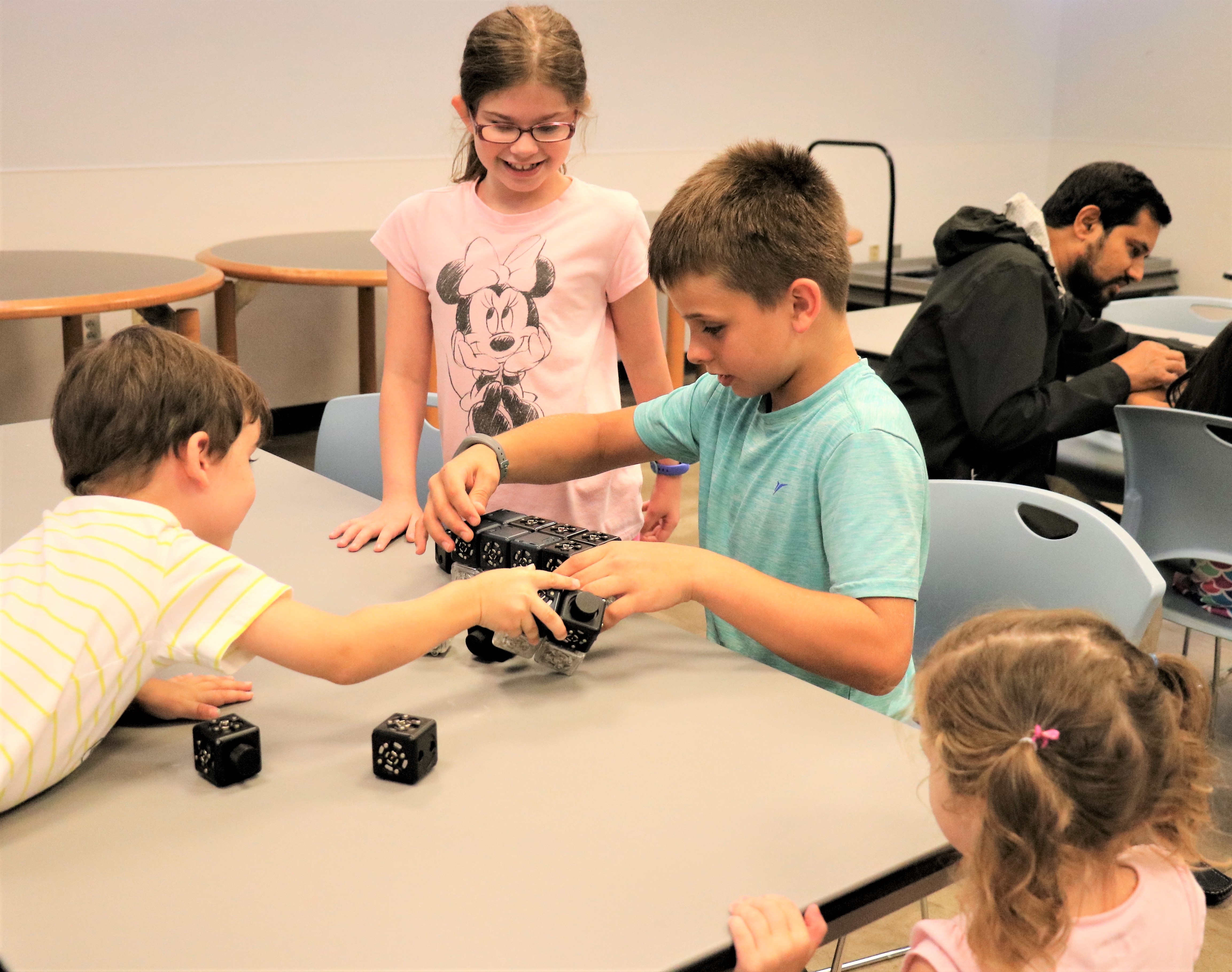 Kids playing with cubelets