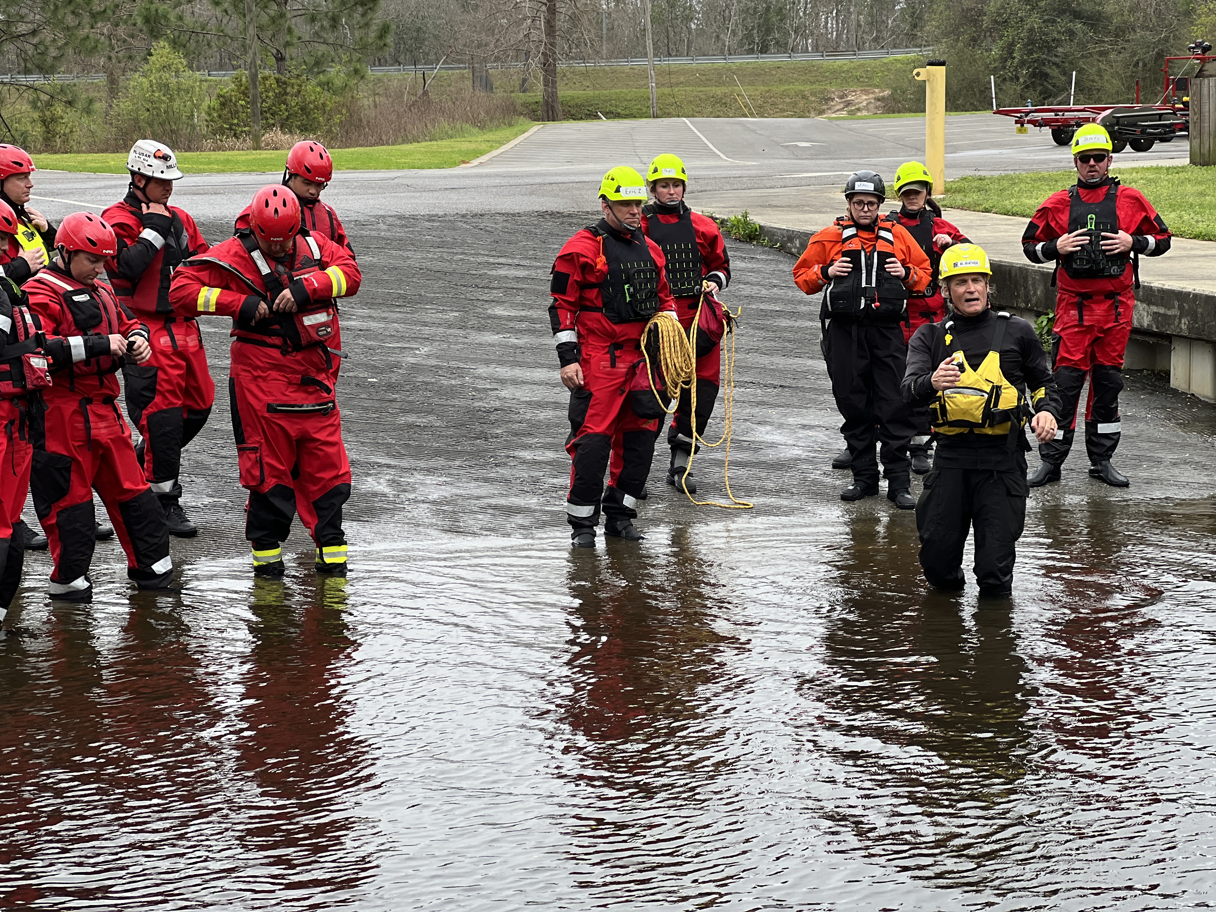 A group of people about to enter the Perdido River