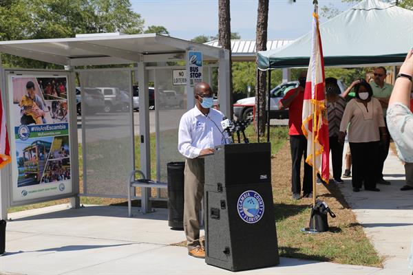 Bus shelter and sidewalks ribbon cutting 