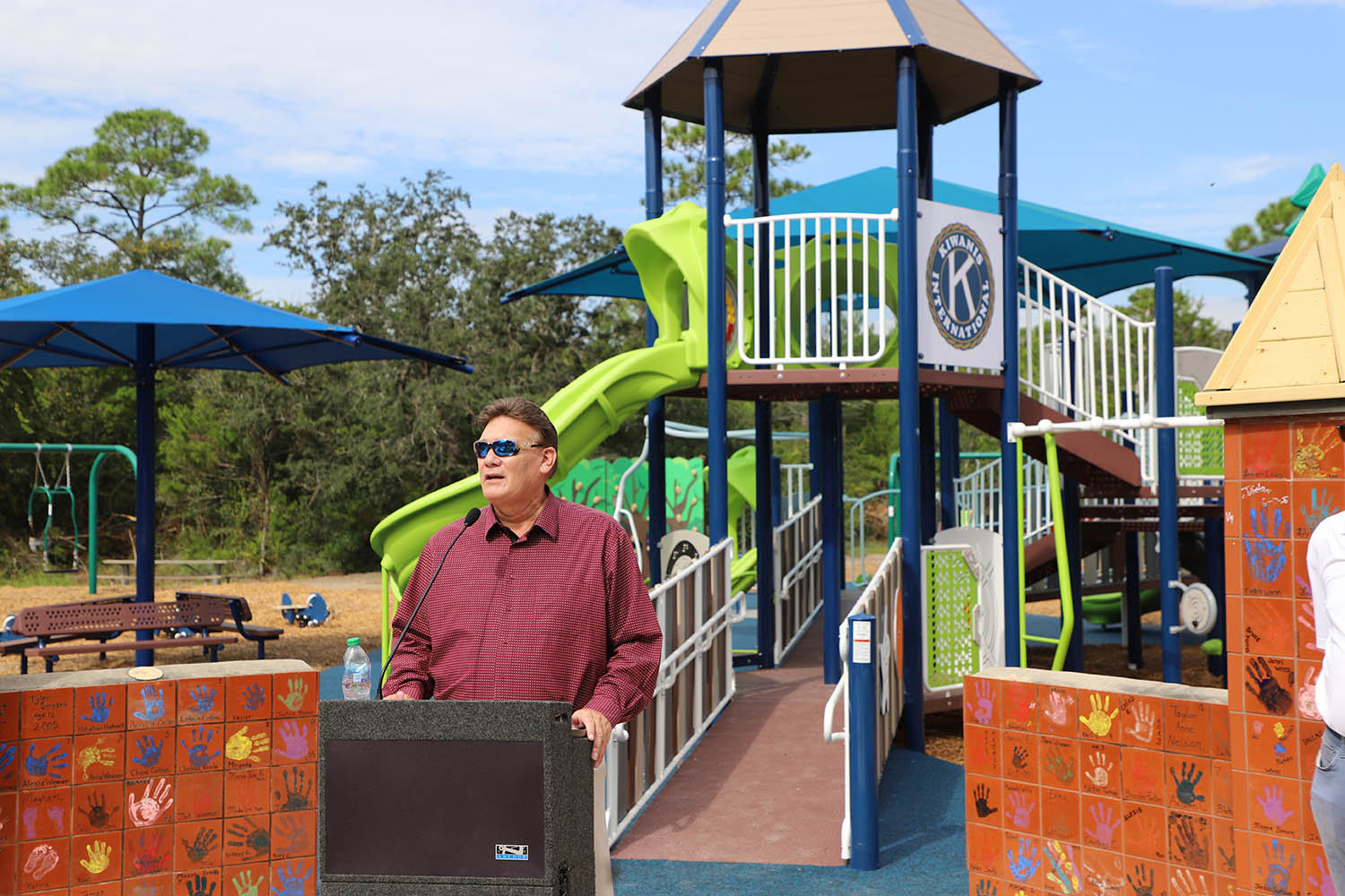 Wes Moreno speaks at the Perdido Kids Park Ribbon Cutting