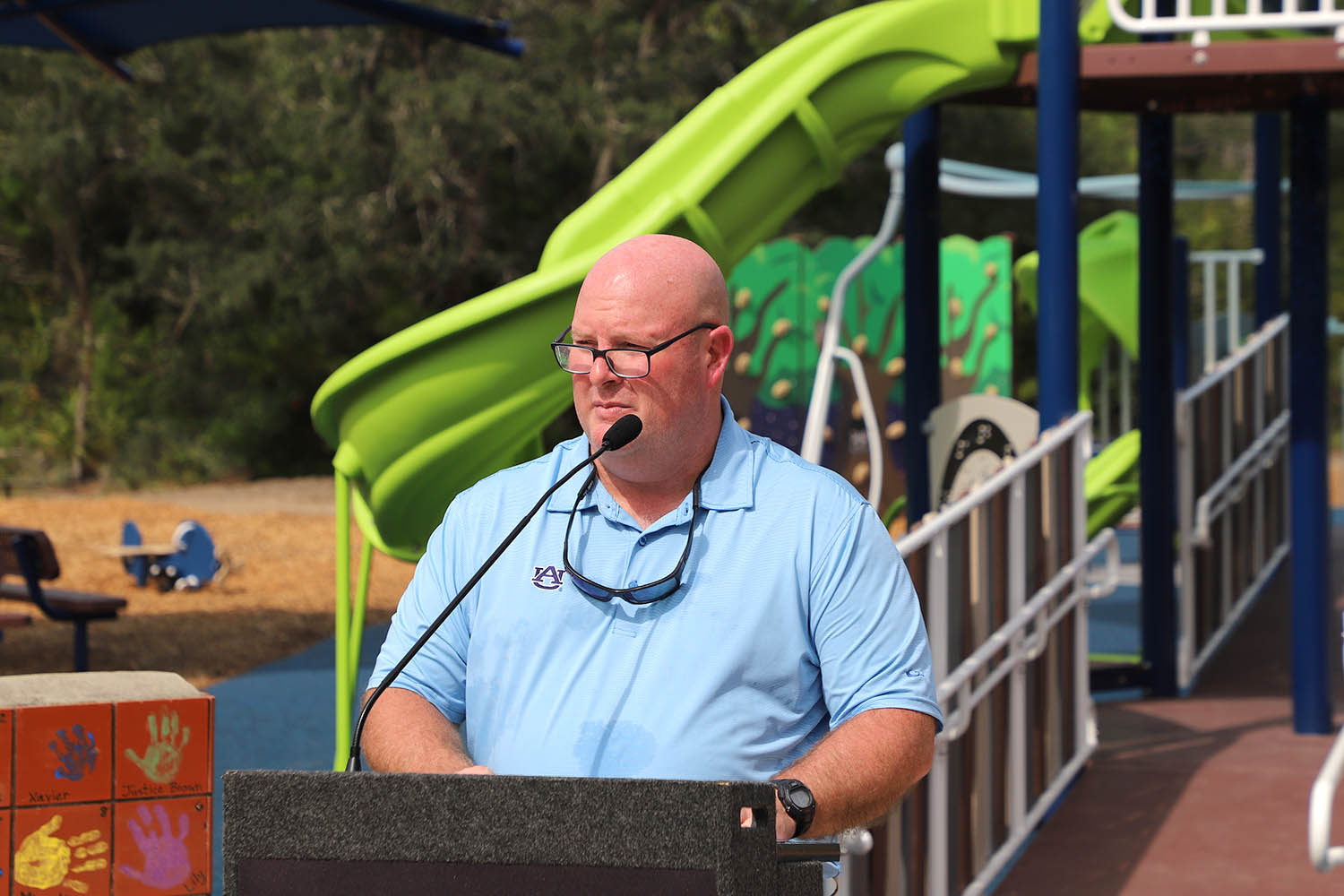 Michael Rhodes speaks at Perdido Kids Park Ribbon Cutting