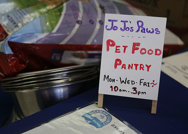 Jo Jo's Paws distributes pet food at Escambia County Animal Welfare