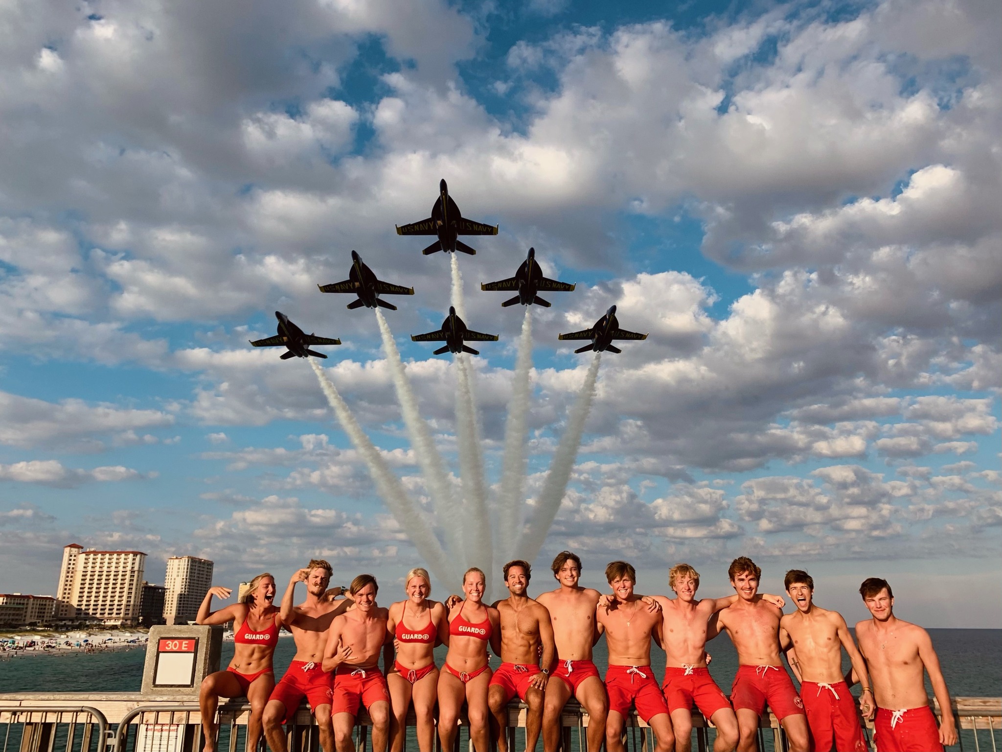 Lifeguards on the Pier with the Blue Angels flying overhead.