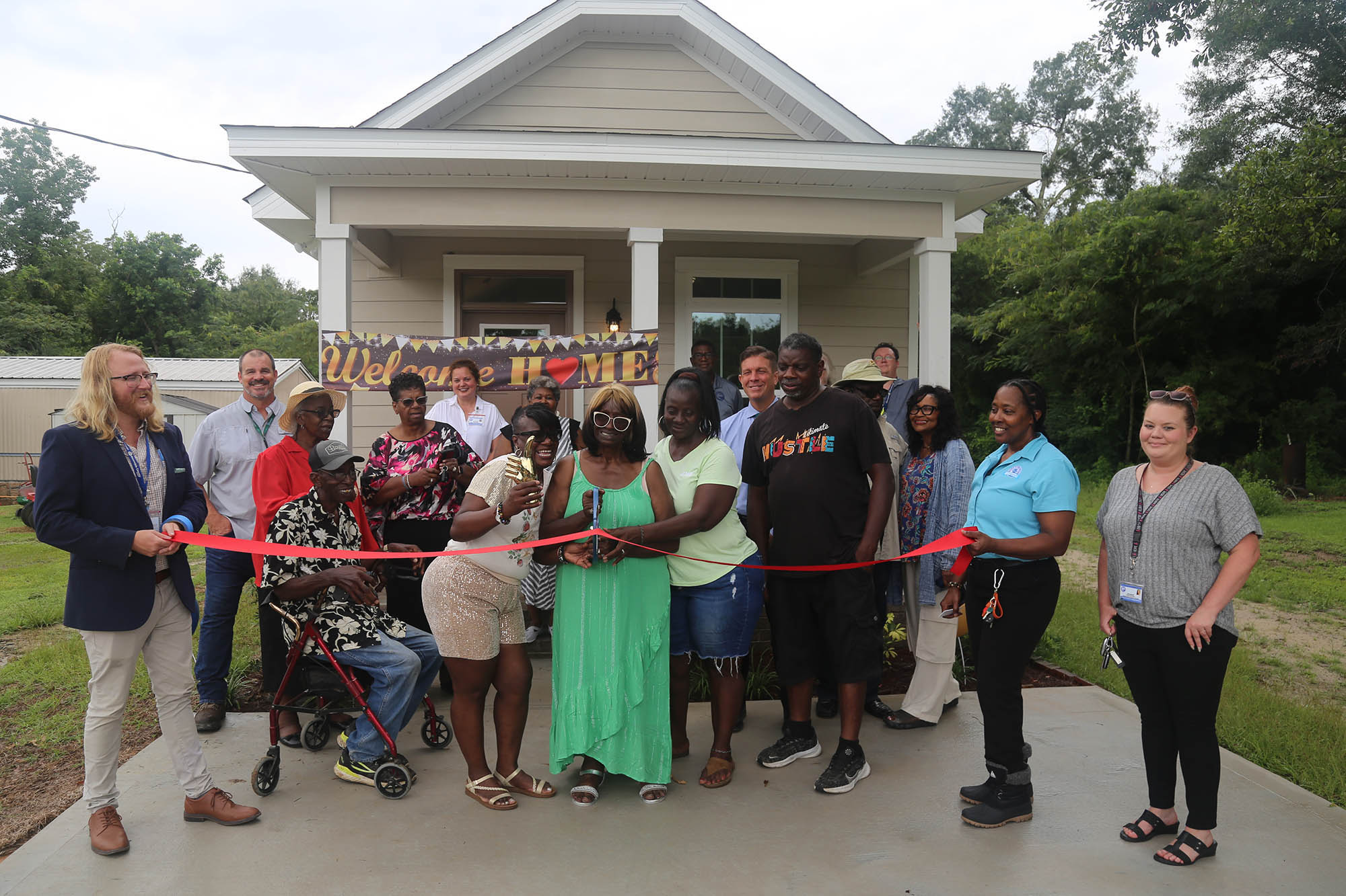 Mary Simpkins celebrates her new home on Wednesday, July 10