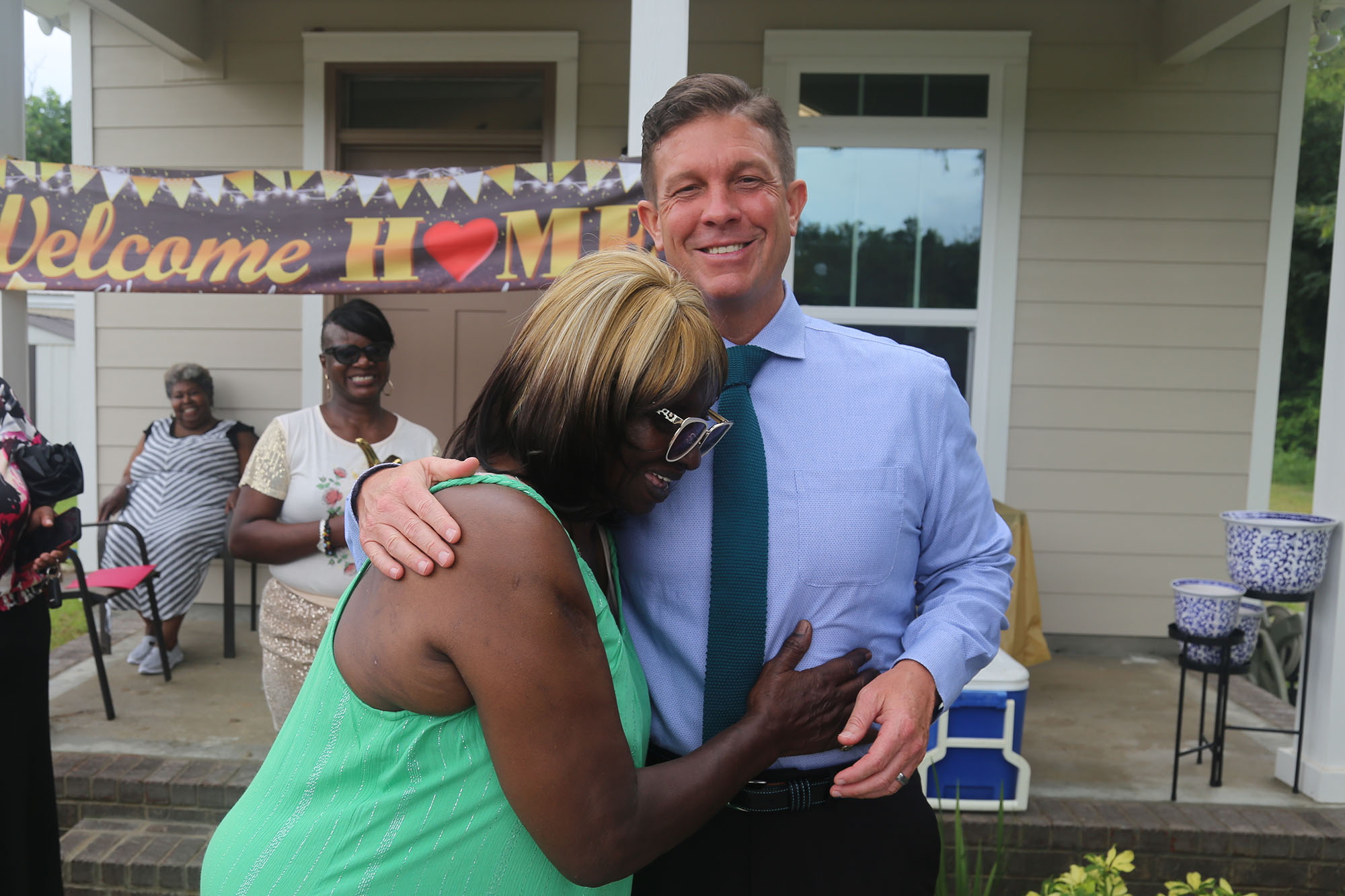 Mary Simpkins receives the keys from Commissioner Steven Barry