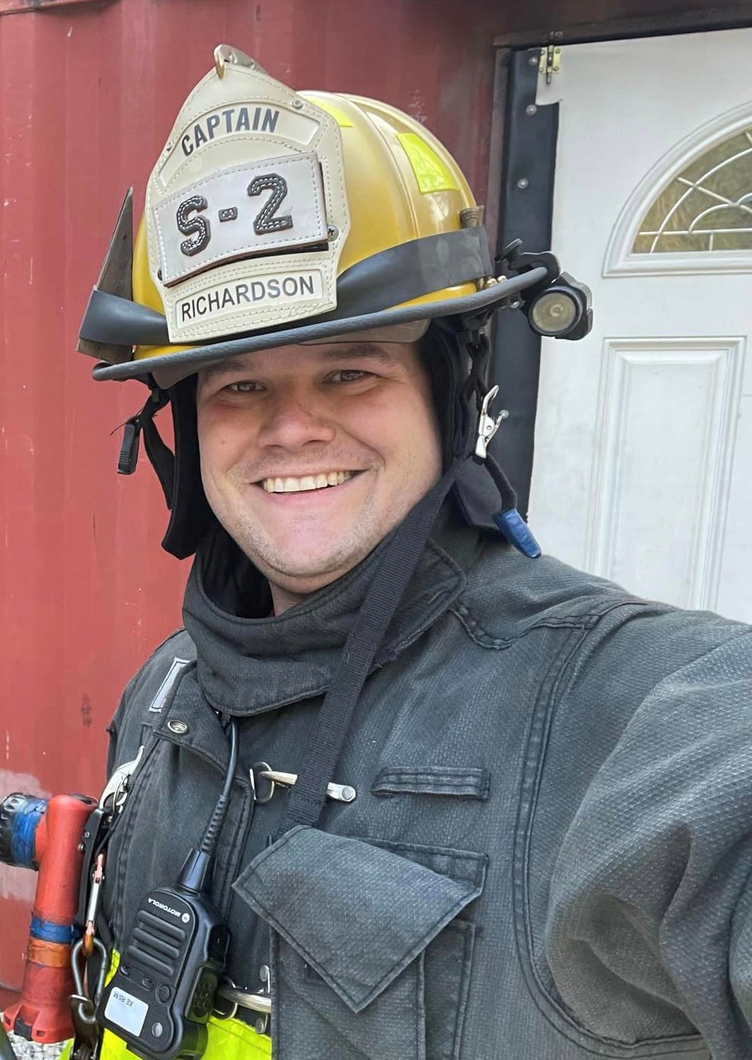 Captain Richardson in full fire uniform