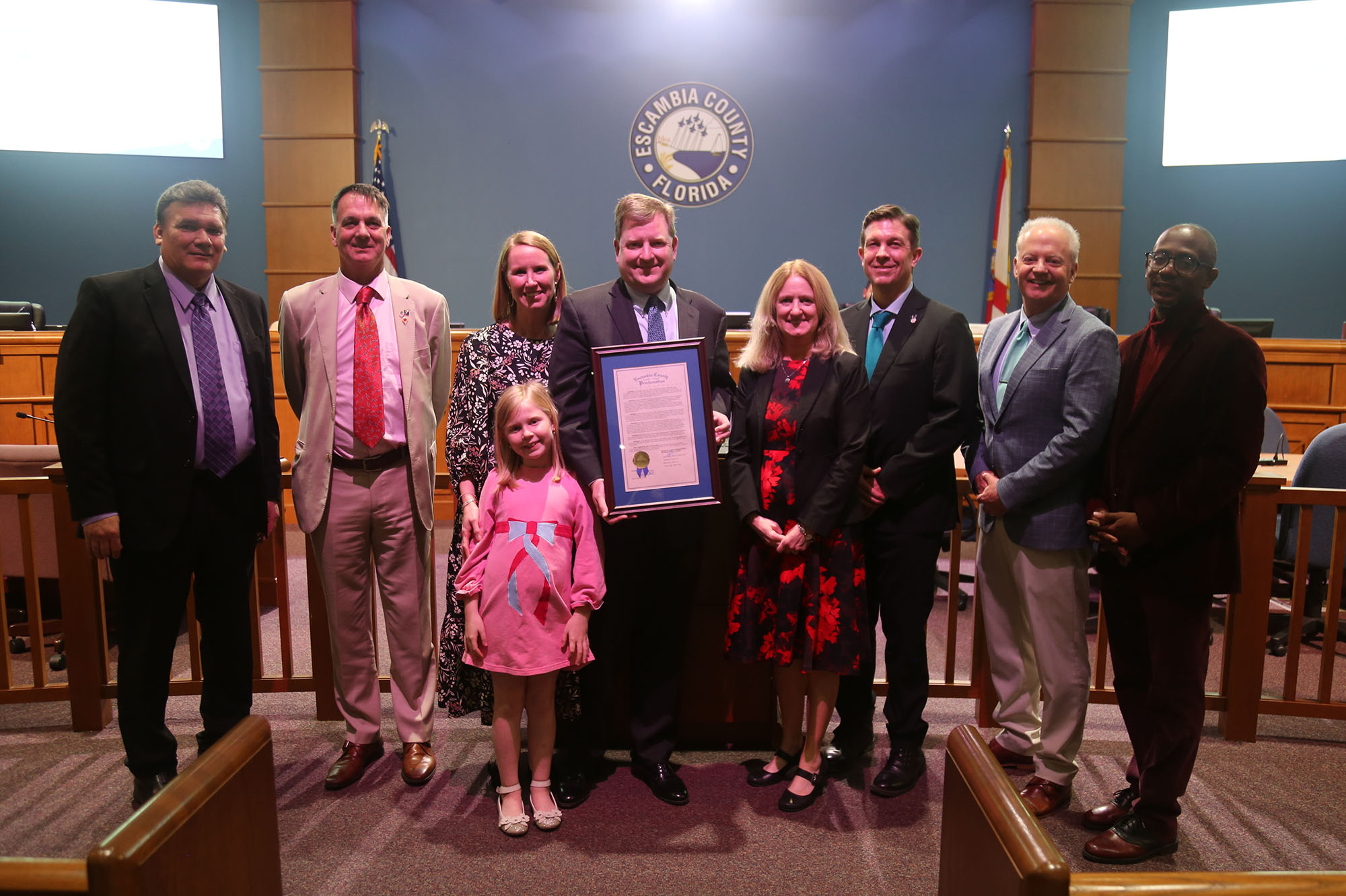 Robert Bender, his family, the board, and County Attorney Alison Rogers during the Feb. 8 BCC meeting