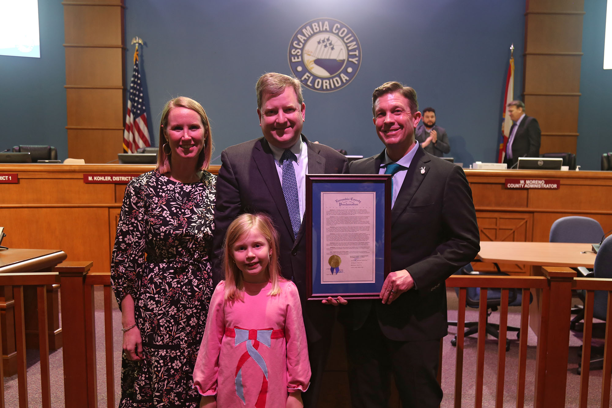 Robert Bender, his family, and District 5 Commissioner Barry