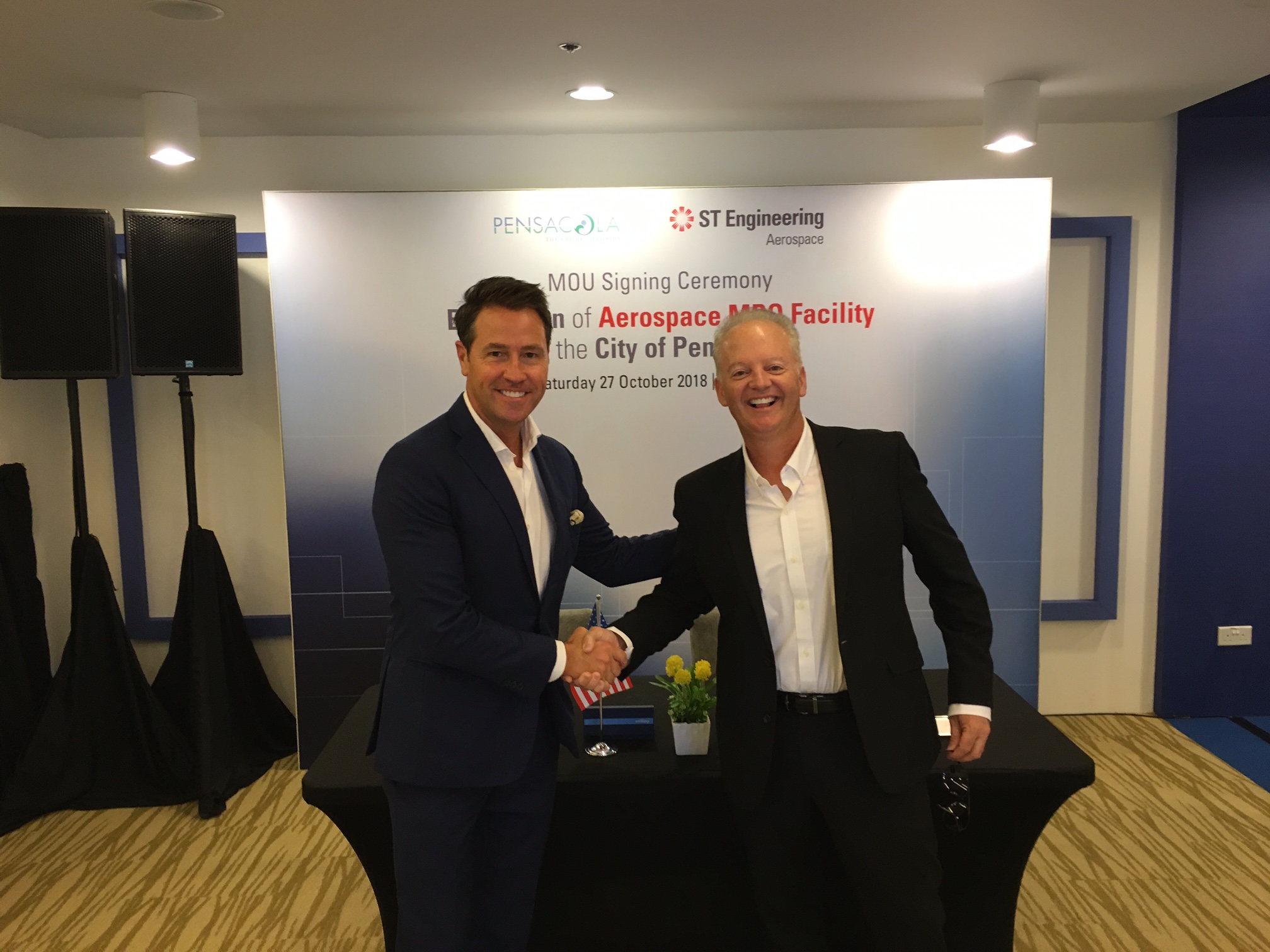 Commissioner Bergosh and Mayor Hayworth at the Aerospace MRO Facility MOU Signing Ceremony in Singapore 