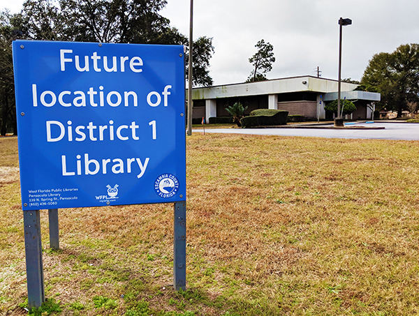District 1 library small Sign showing the future site of the District 1 public library