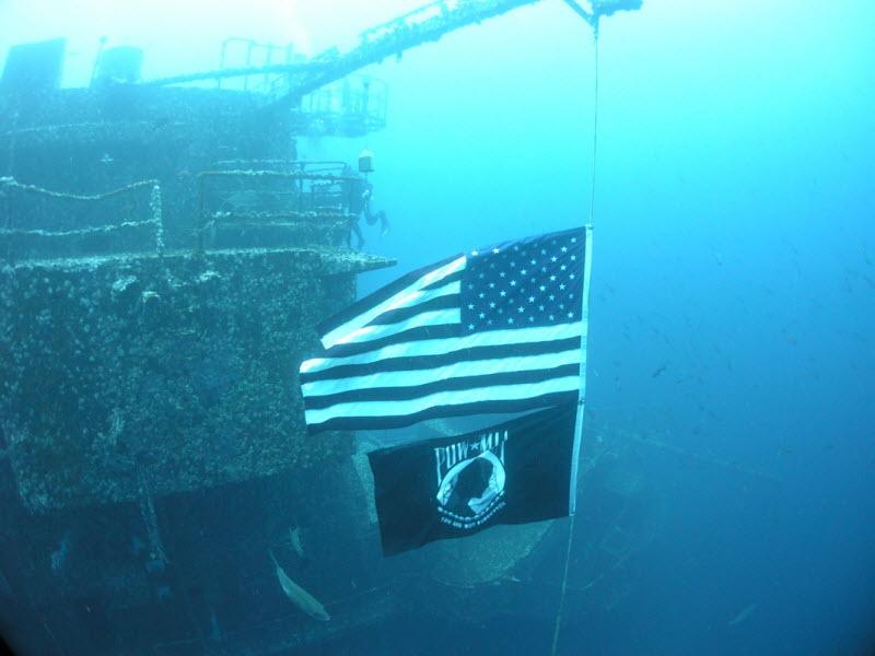 U.S. and POW MIA Flags Fly on the Oriskany Reef 