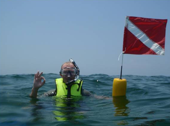 Snorkeler with Diver&#39;s Flag