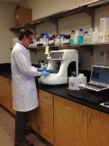 A Staff member Uses a Water Quality Lab AQ1 Nutrient Analyzer