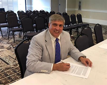 Commissioner Robinson Signing of Final Plan Commissioner Robinson Signing of Final Plan