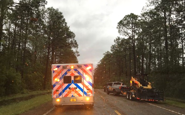 EMS crews navigate roadways in Bay County to transport patients after Hurricane Michael.