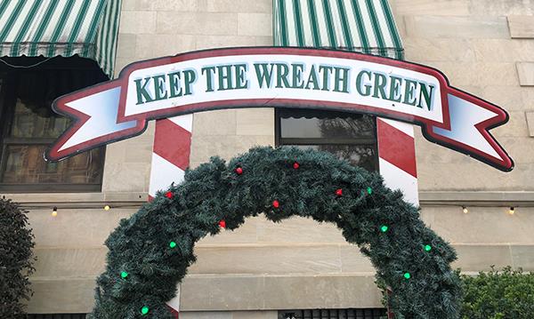 Keep the Wreath Green A fire safety wreath with red and green lights on it