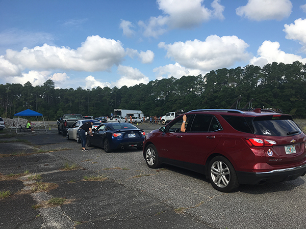 Regional Roundup 98 3 Vehicles line up to drop off items to be disposed of during the Saturday, June 9 Regional Roundup.